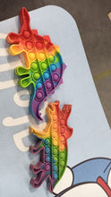 Vibrant rainbow push  bubble toy for interactive fun