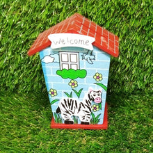 Piggy bank designed as a house